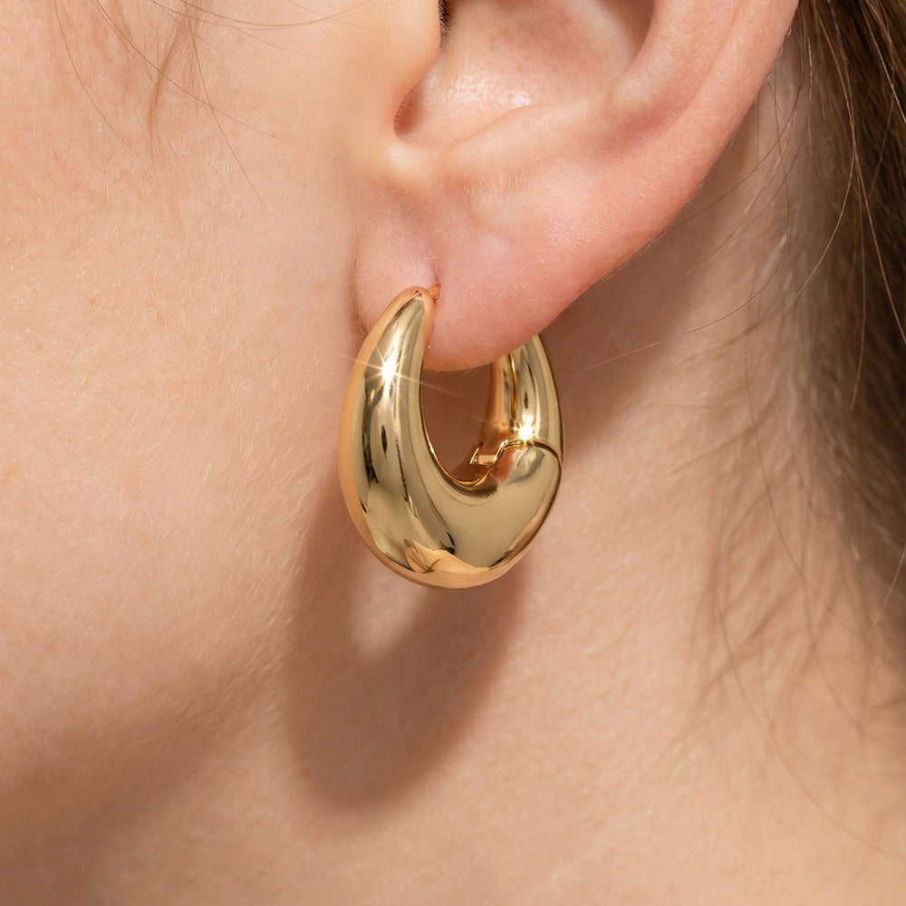 Chunky Dome Huggie Hoop Earrings — on model