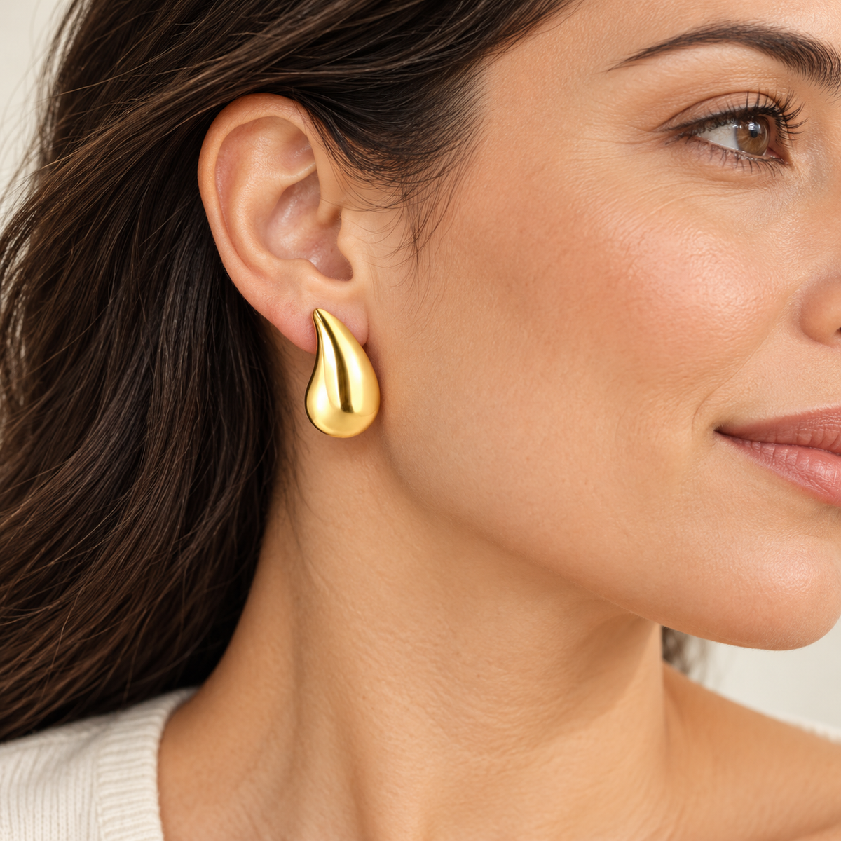 Puffy Teardrop Stud Earrings — on model