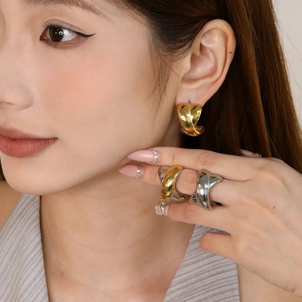 Crossover X Stud Earrings — on model