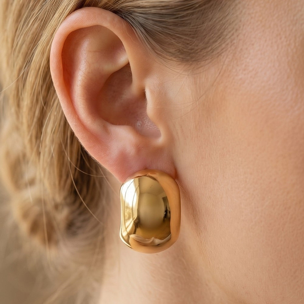 Large Puffy Dome Stud Earrings — on model