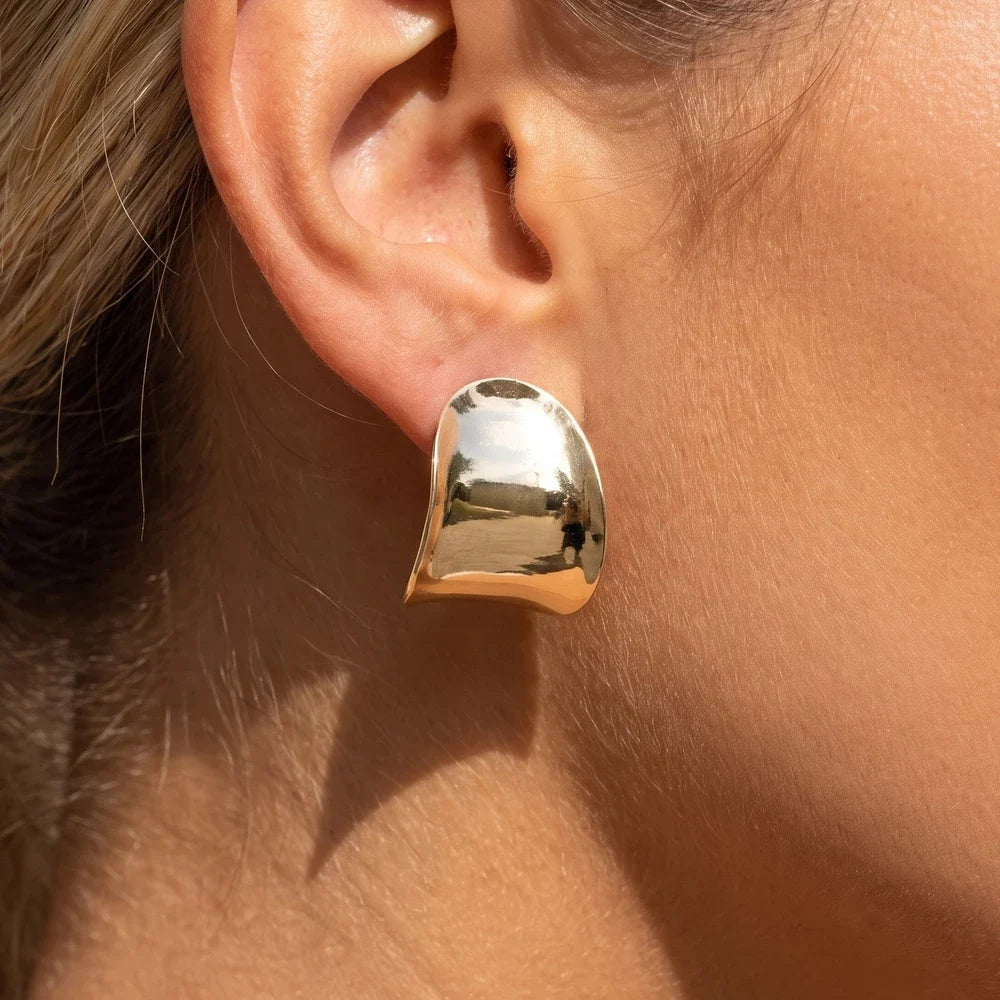 Sculpted Wide Curved Hoop Earrings — on model