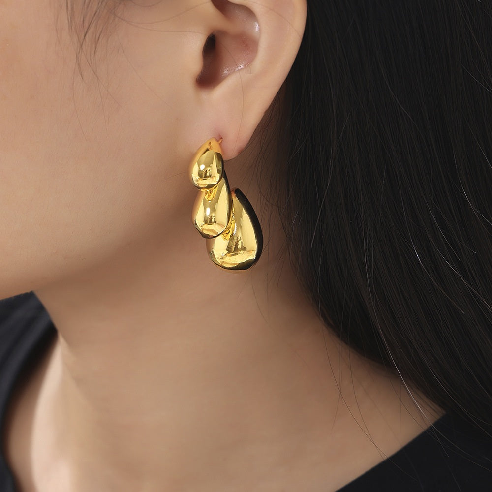 Teardrop Drop Earrings — on model
