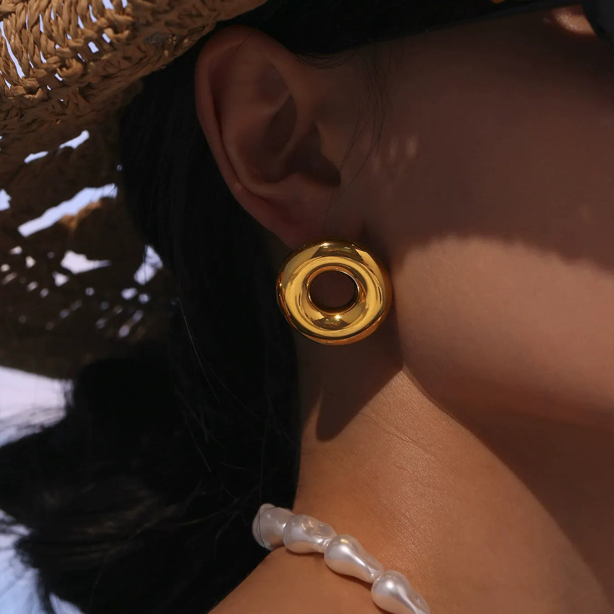 Hollow Circle Stud Earrings — on model