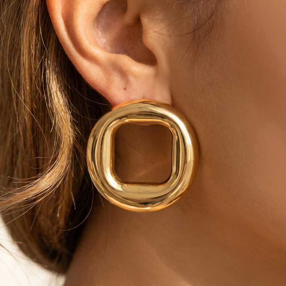 Chunky Puffed Open Circle Stud Earrings — on model