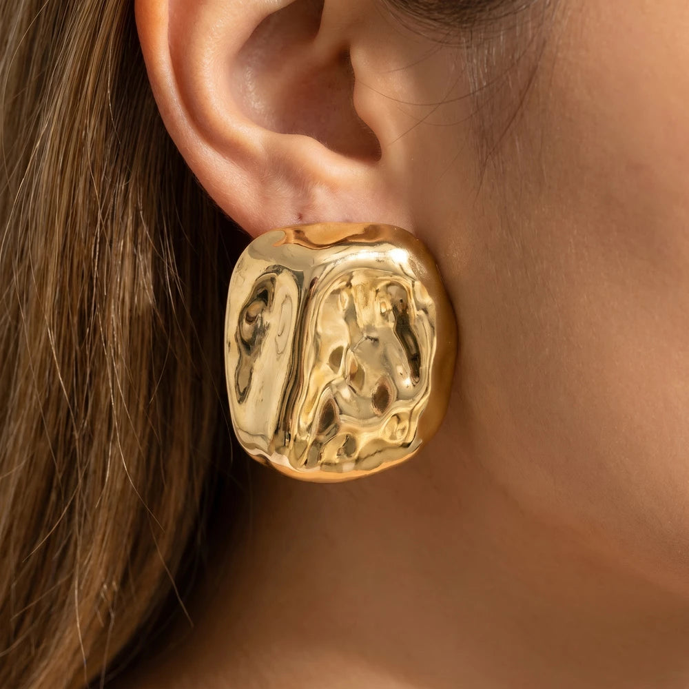 Hammered Dome Stud Earrings — on model
