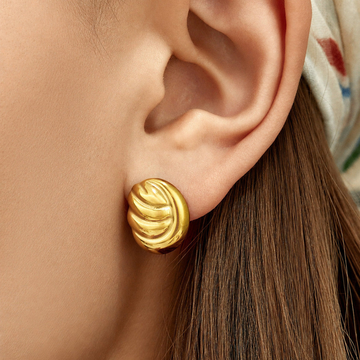 Ribbed Swirl Stud Earrings — on model