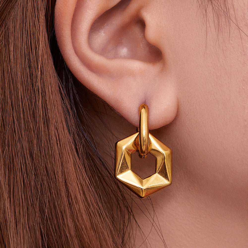 Hollow Hexagon Hoop Earrings — on model
